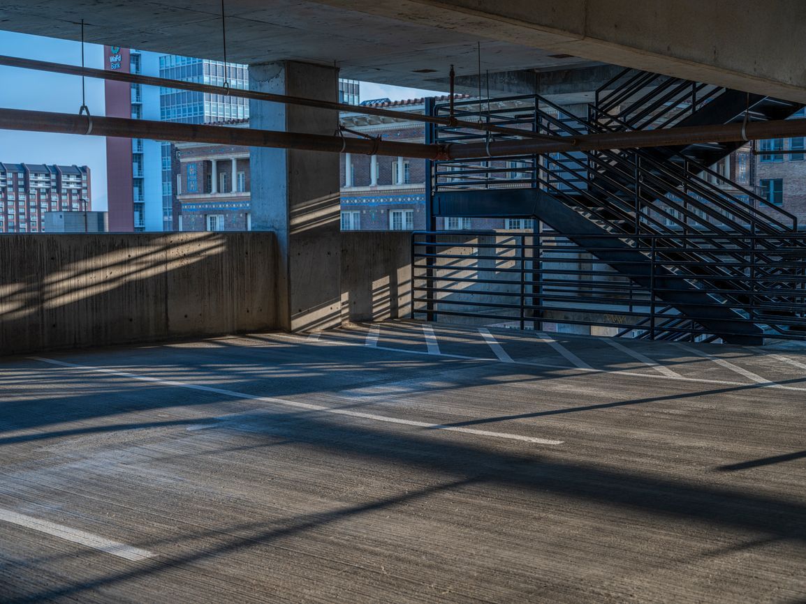 View of A stunning cityscape skyline at sunset, with illuminated high-rise ...