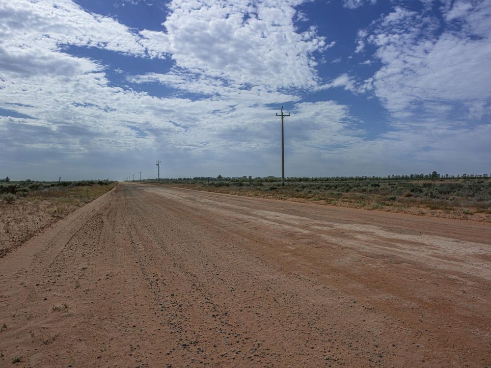 Endless Dirt Road Through Desert Landscape - HDRi Maps and Backplates