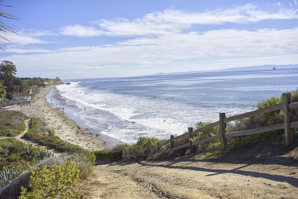 Oceanfront Area with Wooden Rail Railing Overlooking the Beach, Santa ...