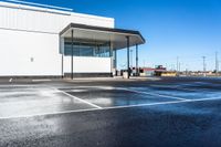 a parking lot that has been completely coated with concrete and black asphalting off of it