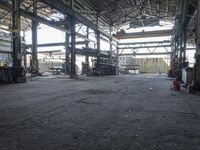 the inside of an abandoned factory with lots of machinery and people working on it and some workers