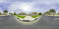 a fish eye lens shot of the street in abu dhabi, united arab countries this photograph is taken from below