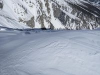 Aerial View of the Alps in France: Snow-Covered Peaks and Glacial Beauty