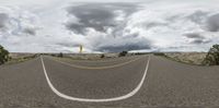 a 3d rendering of a winding road in the desert with a sky in the background