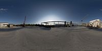 an aerial view of a construction site from a fish - eye lens looking towards the front