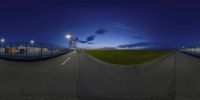 360 - vision of a highway with two road curves in the front and a sky in the back