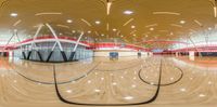 an indoor sports court is shown through 360 - up glass eyeshotes at various angles