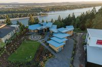 Aerial View of Lake and Neighborhood Property