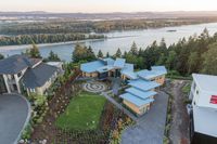 Aerial View of Lake and Neighborhood Property