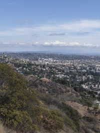 a view of los from the top of a mountain, overlooking a cityscape