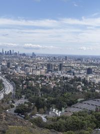 a view of los from the top of a mountain, overlooking a cityscape