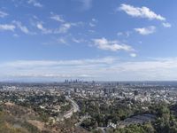 a view of the city and the road from above in this time lapsure shot