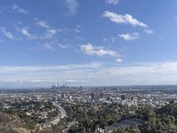 a view of the city and the road from above in this time lapsure shot