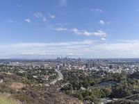 a view of the city and the road from above in this time lapsure shot