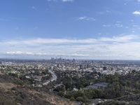 a view of the city and the road from above in this time lapsure shot