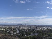 a view of the city and the road from above in this time lapsure shot