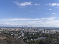 a view of the city and the road from above in this time lapsure shot