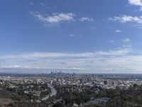 a view of the city and the road from above in this time lapsure shot