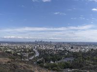 a view of the city and the road from above in this time lapsure shot