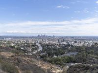 a view of the city and the road from above in this time lapsure shot