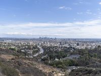 a view of the city and the road from above in this time lapsure shot