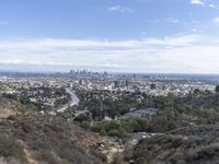 a view of the city and the road from above in this time lapsure shot