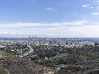 a view of the city and the road from above in this time lapsure shot