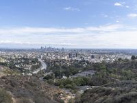 a view of the city and the road from above in this time lapsure shot