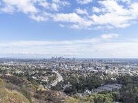 a view of the city and the road from above in this time lapsure shot