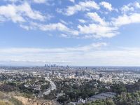 a view of the city and the road from above in this time lapsure shot