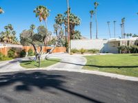 a driveway that leads to a house in the mountains above palm springs, ca aerial view