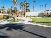 a driveway that leads to a house in the mountains above palm springs, ca aerial view