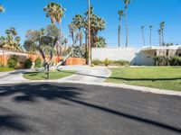 a driveway that leads to a house in the mountains above palm springs, ca aerial view