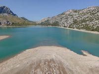 Aerial View of Mountain Lake with Sandy Shoreline