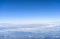 Aerial View of Mountain Range Over the Cloud