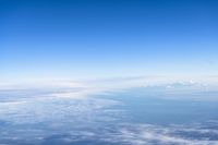 Aerial View of Mountain Range Over the Cloud