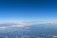 Aerial View of Mountain Range Over the Cloud