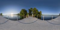 a fish eye view is seen in this image of a park with an area that contains two water sports fields