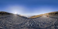 a 3d picture of a view of the road from below the clouds in the background