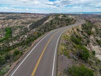 Aerial View of Road in Utah: Asphalt and Stunning Landscape