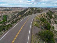 Aerial View of Road in Utah: Asphalt and Stunning Landscape