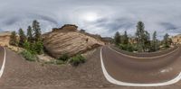 an image of a mountain road taken from a fisheye lens by a fisheye lenser