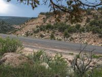 Aerial View of Utah: Winding Road Through Mountain Landscape