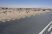 African Desert Road: Clear Skies and Vast Horizons