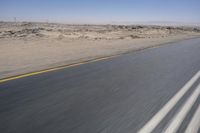 African Desert Road: Clear Skies and Vast Horizons