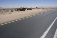 African Desert Road: Clear Skies and Vast Horizons