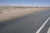 African Desert Road: Clear Skies and Vast Horizons