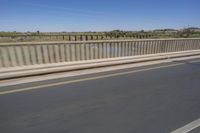 African Landscape: Clear Sky and Coastal Bridge