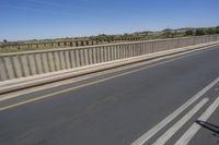 African Landscape: Clear Sky and Coastal Bridge