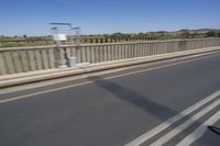 African Landscape: Clear Sky and Coastal Bridge